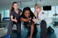 physical therapist with patient