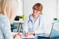 image of doctor speaking with patient