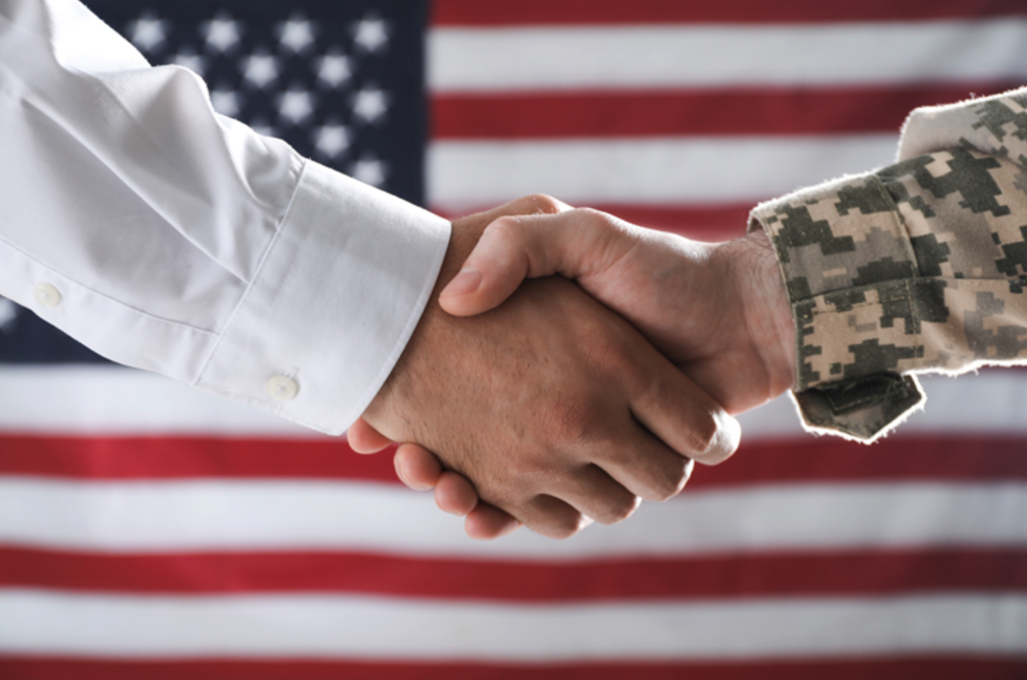 doctor and veteran shaking hands